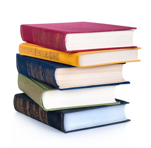 stack of self help books